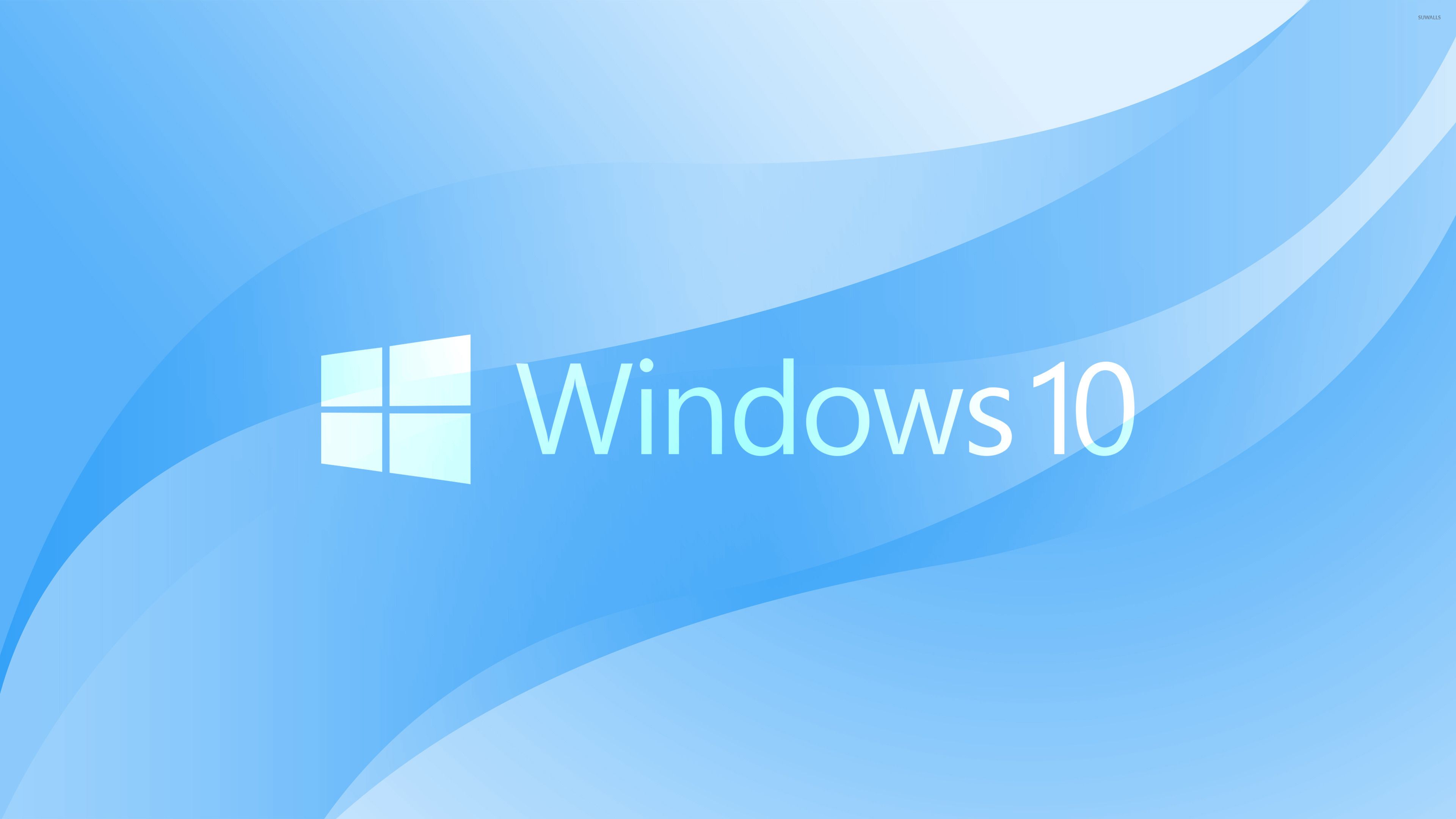 Logotipo de texto blanco de Windows 10 sobre fondo azul claro - Computadora