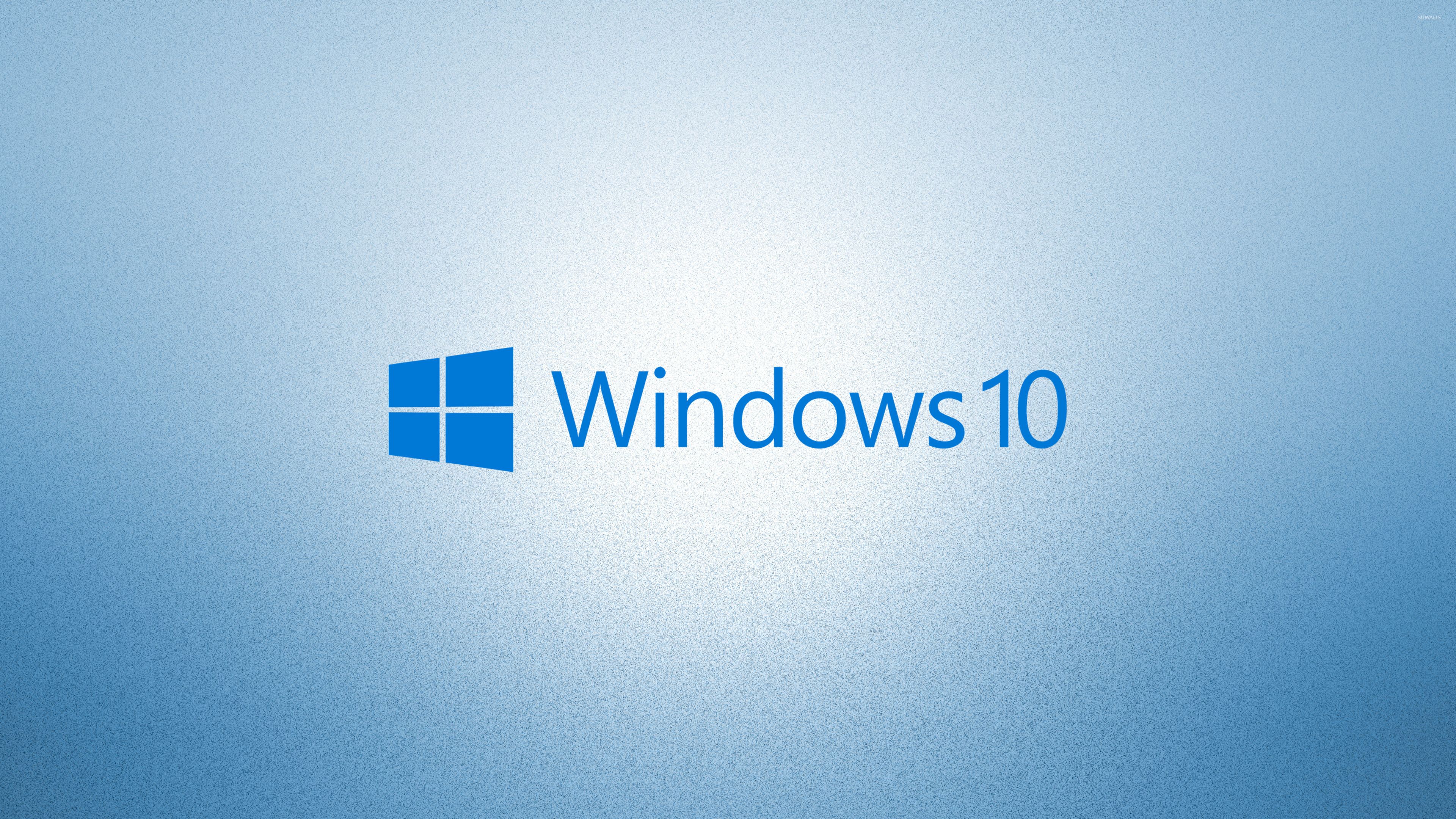 Logotipo de texto azul de Windows 10 en fondo de pantalla azul claro - Ordenador