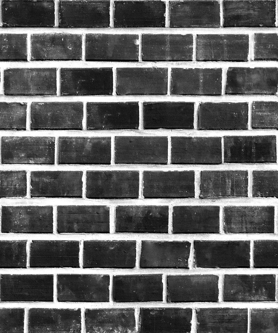 Fondo de pantalla de Lubeck Bricks • Ladrillos negros expuestos • Milton & King