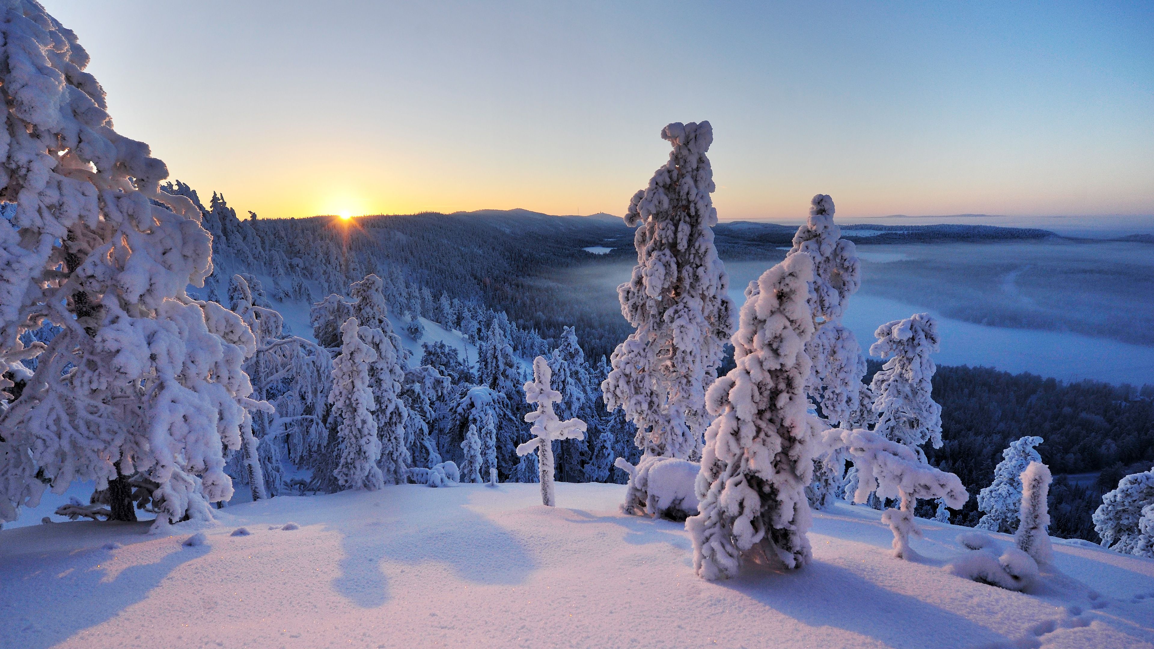Finlandia Snowy Hills Sunset 4K Ultra HD Fondos de Escritorio
